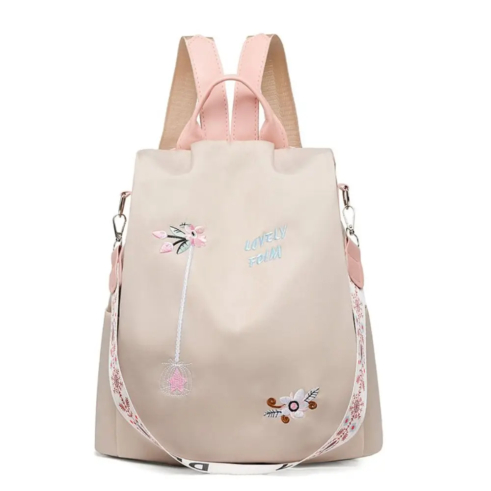 Sac à dos femme antivol en tissu Oxford - imperméable - grande capacité - style brodé. – Image 3