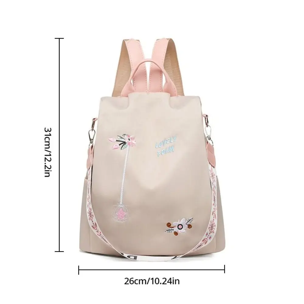 Sac à dos femme antivol en tissu Oxford - imperméable - grande capacité - style brodé. – Image 5
