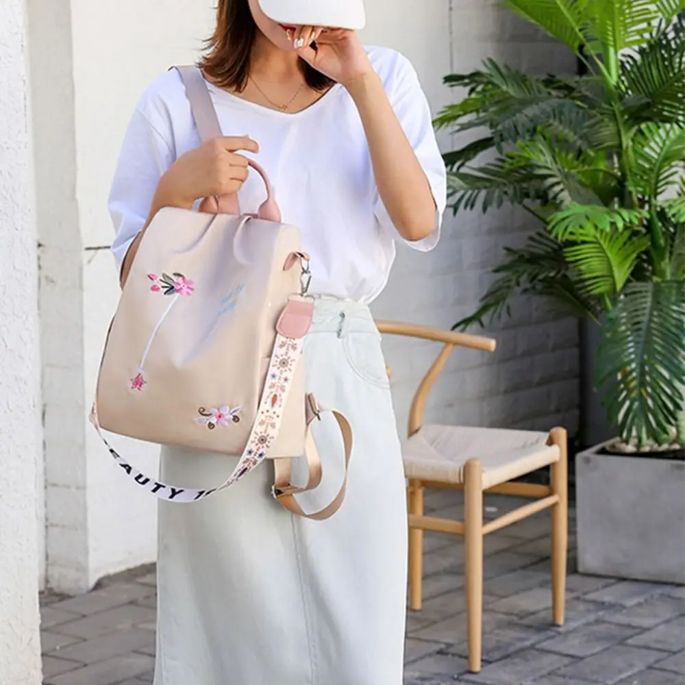 Sac à dos femme antivol en tissu Oxford - imperméable - grande capacité - style brodé. – Image 6