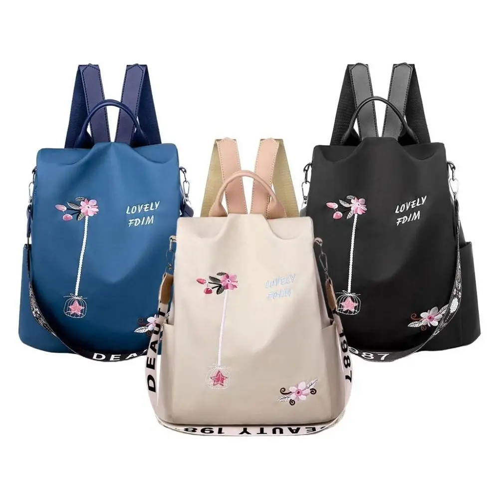 Sac à dos femme antivol en tissu Oxford - imperméable - grande capacité - style brodé.