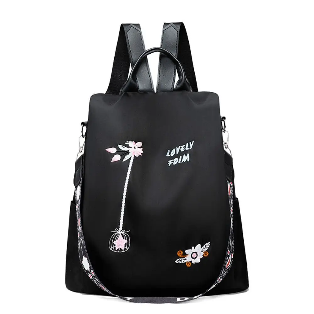 Sac à dos femme antivol en tissu Oxford - imperméable - grande capacité - style brodé. – Image 2